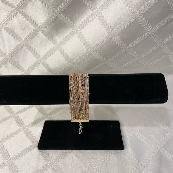Elegant Gold and Silver Tone Multi-Strand Bracelet - Picture 1 of 6